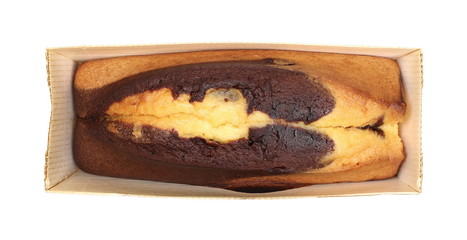 Vanilla and cocoa cake, bread loaf in paper packaging isolated on white background, top view