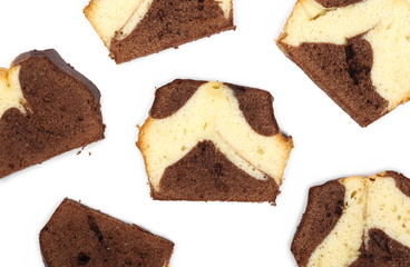 Vanilla and cocoa cake, bread slices isolated on white background, top view