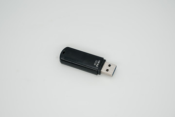 Old usb flash drive on a light background close up