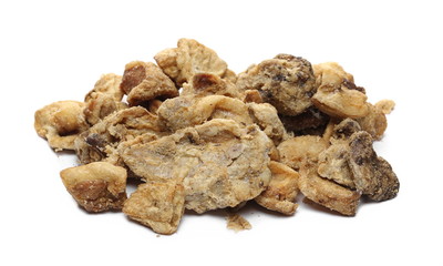 Pork cracklings, greaves isolated on white background