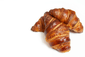 Delicious croissants on a white background