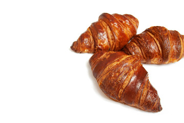 Delicious croissants on a white background