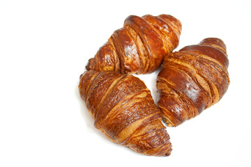 Delicious croissants on a white background