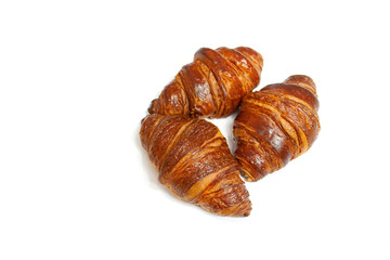 Delicious croissants on a white background