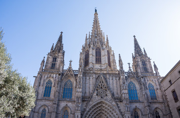 Fototapeta na wymiar Close up of the Gothic Cathedral of the Holy Cross and Saint Eulalia (Catedral de la Santa Cruz y Santa Eulalia) in Gothic Quarter in Barcelona