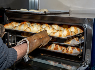 Freshly baked croissants in a bakery in Madrid, Spain