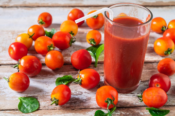 Fresh Tomato Juice with Tomato on Wooden Floor