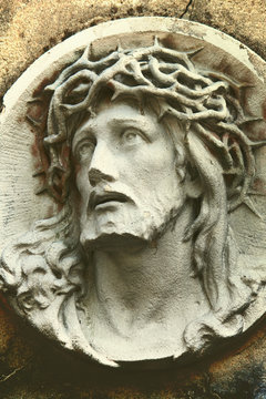 Close up atique statue bas-relief of Jesus Сhrist