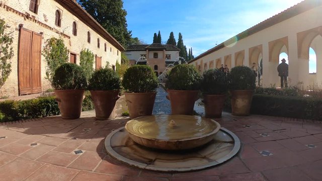 Fountain of "Patio de la Acequia" in the Generalife, Alhambra Palace. Granada, Andalusia, Spain.4K shot.