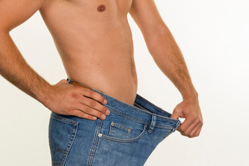 Naklejka premium young man after successful diet