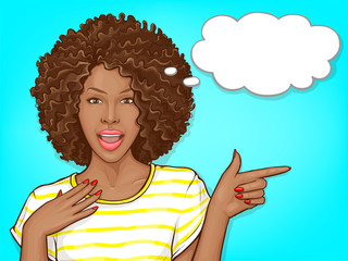 Surprised african american woman with afro hair and open mouth. Delighted black girl pointing by finger to big sale or great offer. Vector pop art illustration of dark skin lady with speech bubble