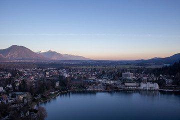 Fototapeta premium Landscape view of Bled from Bled Castle a sunny winterday in sunset