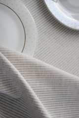 beautiful folds of light fabric, striped fabric made from natural fibers, eco-friendly fabric.