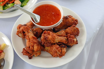 Fried chicken wing or Fried chicken on a plate in thai food style
