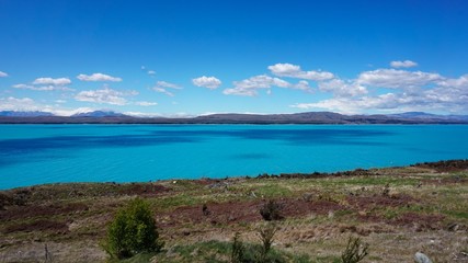 Glacier Lake View with background of snowy Mount Cook on a sunny day