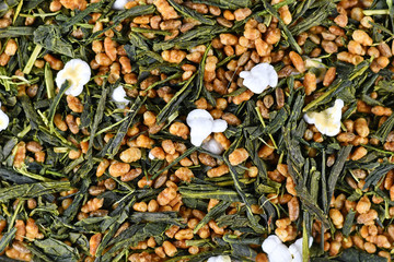 Top view of Japanese 'Genmaicha' tea, a brown rice green tea consisting of green tea mixed with roasted popped brown rice