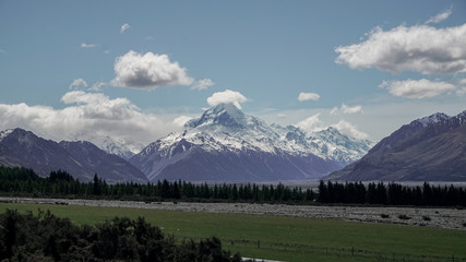 Fototapeta premium Glacier Lake View with background of snowy Mount Cook on a sunny day