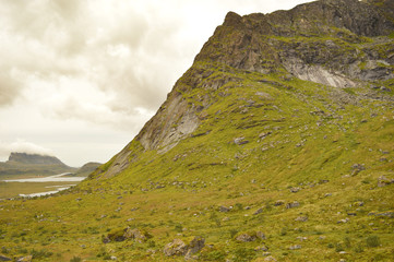 Hike through the mountains on Lofoten Islands in Norway