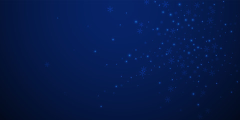 Sparse glowing snow Christmas background. Subtle f