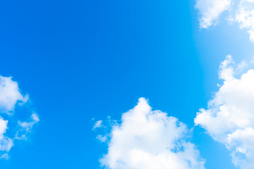 Nature Bright blue Sky with white clouds on blackground. Beautiful sky and clouds in the afternoon.