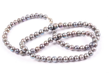 Bead made from wild natural black pearls.