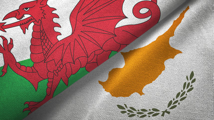 Wales and Cyprus two flags textile cloth, fabric texture