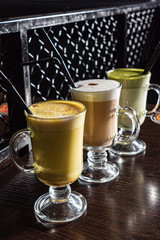 different kinds of cappuccino on the table