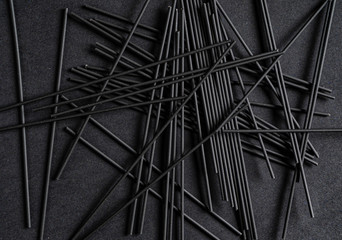 black background with black sticks