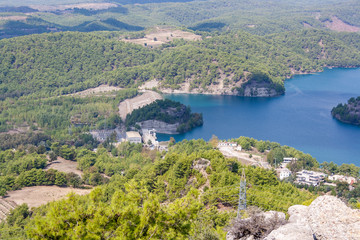 Fototapeta na wymiar view of the power station in a mountain lake