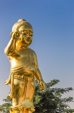 Golden statue of Buddha at the Mayadevi temple in Lumbini, Nepal