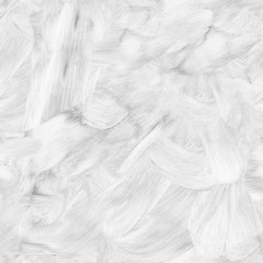Brush strokes with white paint on the surface of the wall.Texture or background