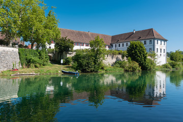 Landscape on the Rhine with former monastery building of the Rhe