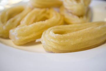 Artisan ring churros in plate