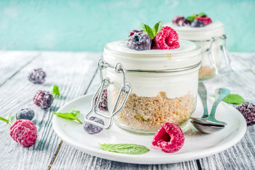 Cheesecake in portioned jars with summer berries