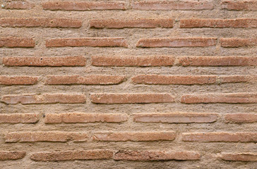 Full frame image of byzantine red brick wall with special thin flat bricks called plinfa. High resolution texture of old antique brickwork for 3d models, background, pattern etc.. Close-up view