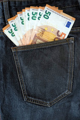 Euro money cask banknote in the pocket of the jeans