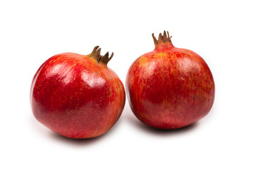 Sweet pomegranate isolated on white background.