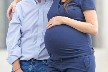 Pregnant woman, belly of a pregnant mother on the ninth month