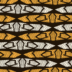 African ethnic seamless pattern in orange colors on dark background .