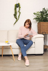 Fototapeta premium Pretty girl relaxing at home