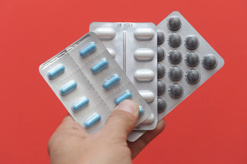 drug and medicine tablets with euro banknotes money