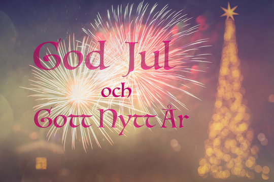 "God Jul och Gott Nytt Ar" means "Merry Christmas Happy New Year" in Swedish. Blurred background of beautiful decorated Christmas tree with golden lights. Fireworks. Bokeh. 2020. Greeting Sweden. 