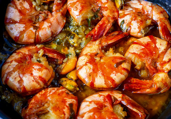 Fried shrimps on pan, closeup.