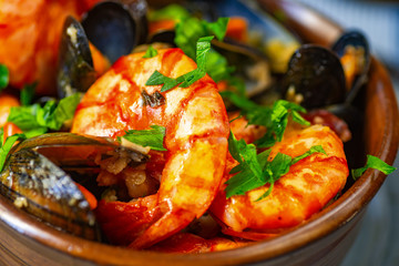 Fried shrimps and boiled mussels.