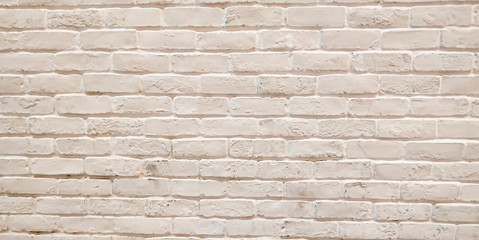 Modern white brick wall texture background for wallpaper and graphic web design . White brick wall background. Neutral texture of a flat brick wall close-up.