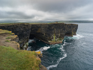 Scenic view of the cliffs along coast, Downpatrick Head, Killala, County Mayo, Ireland