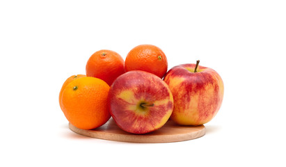 Fototapeta na wymiar tangerines, apples and oranges on a white background