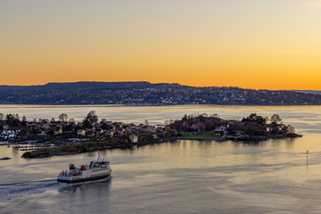Fototapeta premium Oslofjord and Oslo cityscape at sunset, Norway