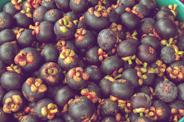 pile of mangosteen in fruit market, sweet and sour tropical fruit of Thailand