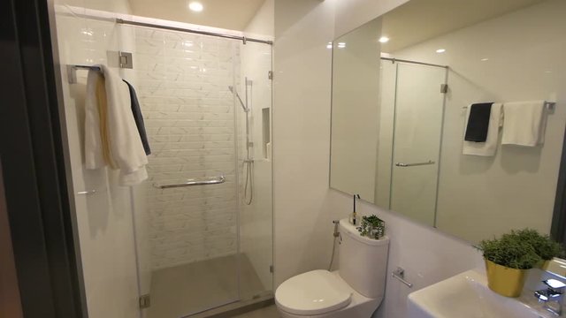 Stylish White Bathroom with beautiful Lighting